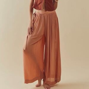 NWOT FREE PEOPLE sliver of light wide leg tie sides pants in blue size S/M